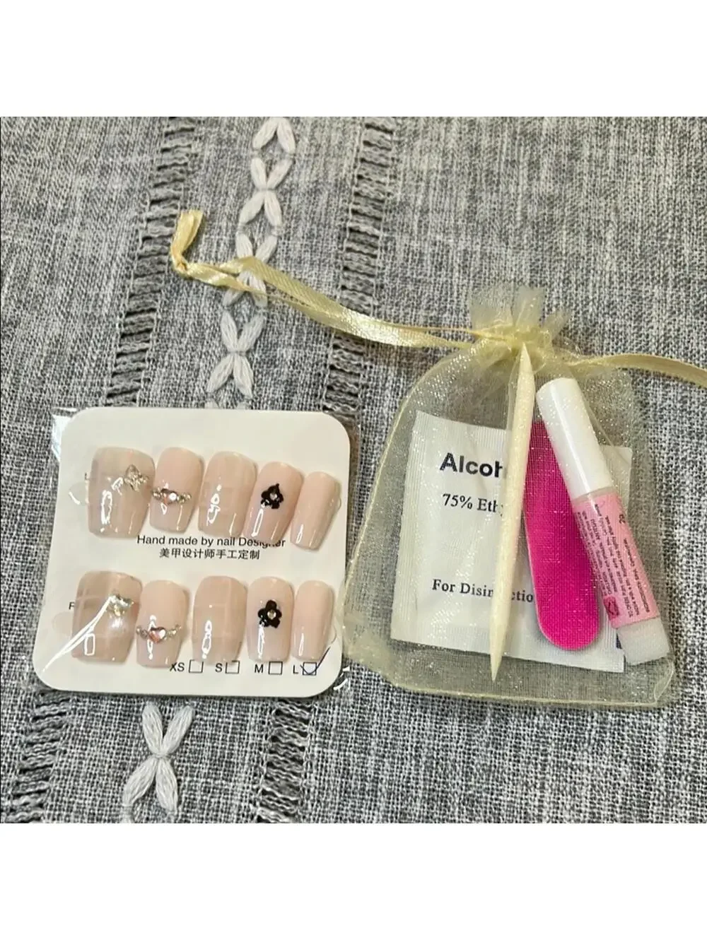 Handmade Nail Art Set with Nude and Pink Accents
